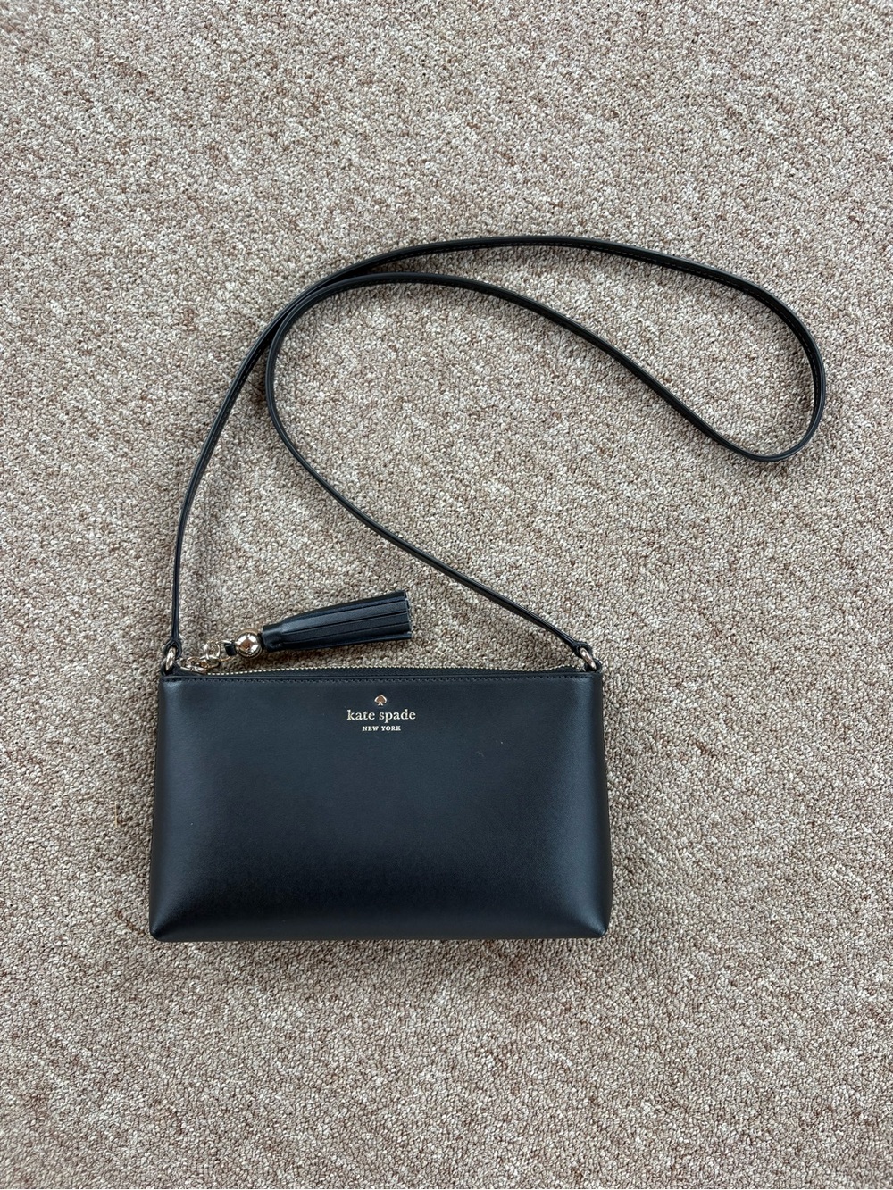 kate spade Black Leather Crossbody with Tassel Strap